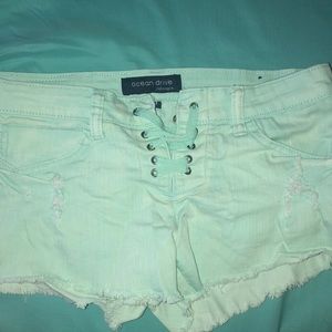 blue ripped shorts with lace up ties!